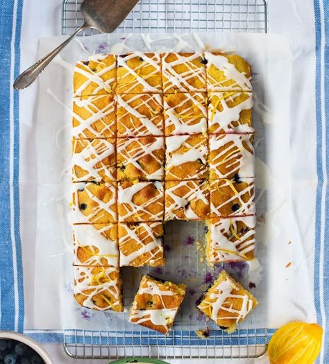 Donal Skehan's blueberry and lemon squares are full of fresh, sweet, vibrant flavours but the best thing about this traybake recipe is its simplicity � it uses the quick all-in-one method which means you weigh out your ingredients, throw them all in and mix together, giving a fragrant batter in a matter of minutes. Healthy Tray Bakes Sweet, Traybake Recipes Sweet, Sweet Tray Bake Recipes, Traybakes Sweet, Blueberry And Lemon Cake, Traybake Recipes, Traybake Cake, Donal Skehan, Cake Squares