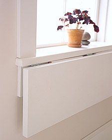 Extend a windowsill by choosing plywood the same thickness as sill; cut it as wide as sill and 12 inches deep. Attach bottom of shelf to bottom of sill with 3 hinges: 1 at the center, the others near the sides. | #DIY Tiny Homes Landing Storage, Kitchen Window Sill, Building Things, Kitchen Table Centerpiece, Window Shelves, High Top Tables, Trendy Apartment, Table Farmhouse, Trendy Bedroom