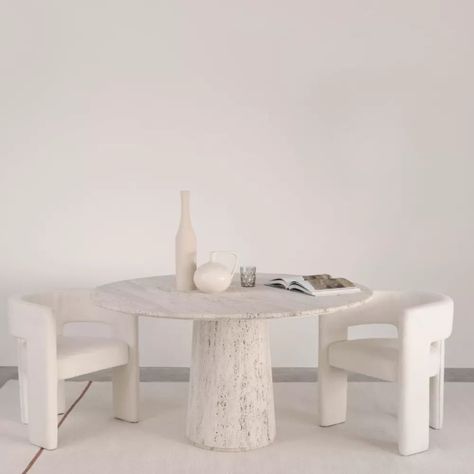 This unique Legna round travertine dining table is the perfect centerpiece for any dining area 🤍  What do you think of this table? Let us know in the comments! ⬇️ #furnified #diningtable #eettafelinspiratie #eettafeltravertin Spain Apartment, Marble Dining Tables, White Round Dining Table, White Round Tables, Durable Carpet, Breakfast Nooks, Deco Salon, Marble Dining, Dining Table Marble