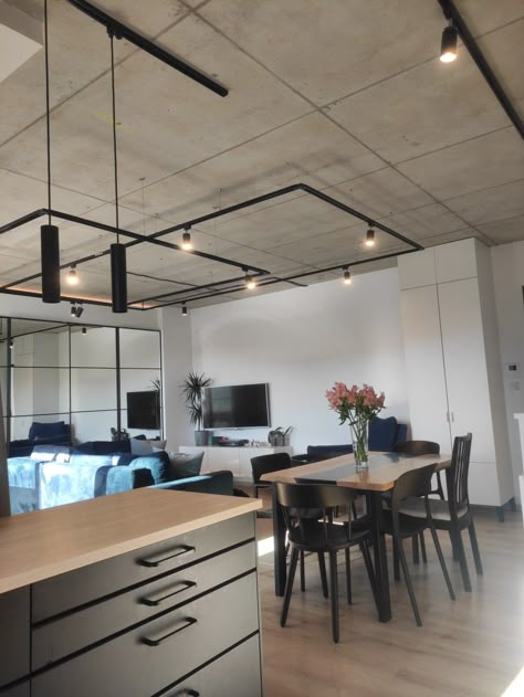 Industrial House Ceiling Design, Living Room Concrete Ceiling, Raw Ceiling Design Office, Modern Industrial Ceiling Light, Concrete Ceiling Lighting Ideas, Concrete Ceiling Design Living Room, Ceiling Concrete Design, Basement Lighting Exposed Ceiling Industrial Style, Concrete Ceiling Kitchen