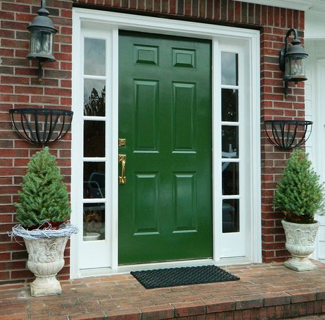 The emerald green and red brick with white trim is crisp and appealing. homeologymodernvintage.com by skrouse1, via Flickr Green Front Door, Unique Front Doors, Best Front Doors, Green Front Doors, Red Front Door, Front Door Paint Colors, Black Front Doors, Door Paint Colors, Red Brick House