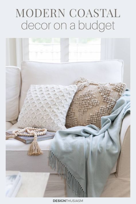 Modern coastal decor is more than beach house decor, touting a serene lifestyle all year long. Here are 4 ways to do modern coastal decor. Affordable Coastal Decor, Mid Century Modern Coastal Interior Design, Coastal Wood Wall, Coastal Chic Furniture, Modern Coastal Living Room Mood Board, Glam Coastal Decor, Coastal Boho Living Room Decor, Modern Coastal Mantle Decor, Coastal Grandmother Style Decor