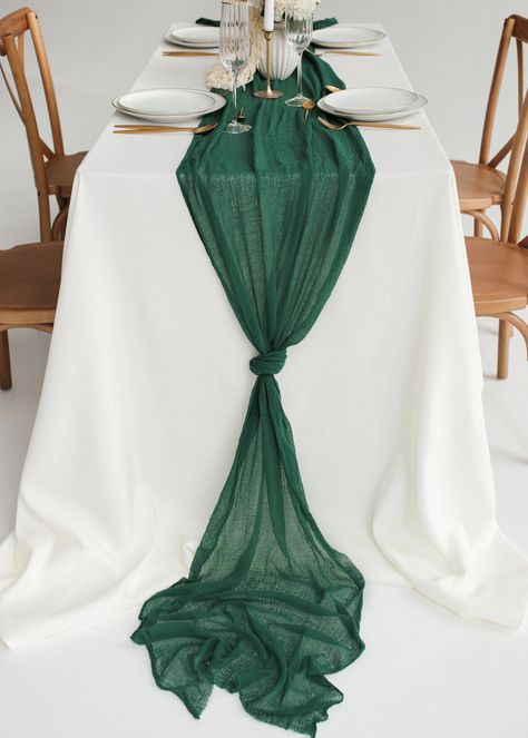 Emerald Green table runner is elegant and sophisticated. Cheesecloth looks absolutely gorgeous as centerpiece table runner or wedding arch decoration. ♥ Place it in the center of the table, don't forget to make relaxed fabric waves, put some candles and flowers on it and enjoy a beautiful rustic style. ♥ You can use cheesecloth as a table runner, tieback for chair or wedding arch decoration. Also, it can be used as a scarf or baby shower decoration. Endings of our cheesecloth are raw (rustic unf Emerald Green Cheesecloth Table Runner, Emerald Table Runner, Emerald Green Wedding Head Table, White Tablecloth Emerald Green Runner, Emerald Green Silver Wedding, Hunter Green Table Cloth Wedding, Emerald Green Quinceanera Theme Wedding Table Decor, Green Cheesecloth Table Runner Wedding, Dark Green Table Runner