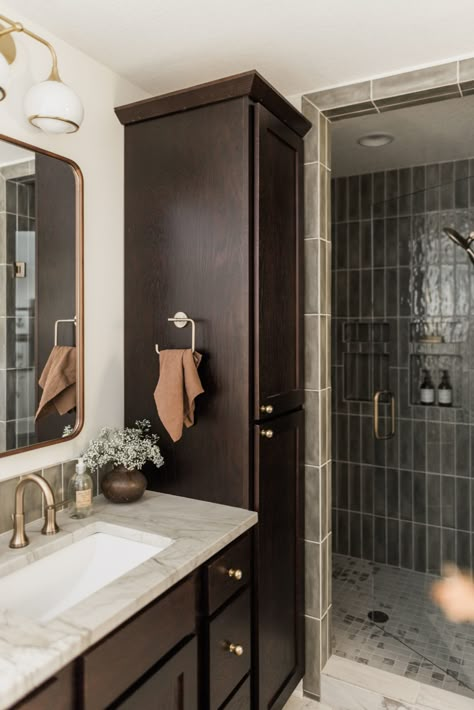 Stained Cabinets Bathroom, Dark Tile Floor Bathroom Wood Vanity, Brown Moody Bathroom, Brown Tile Master Bath, Dark Brown Moody Bathroom, Small Master Bath Remodel, Bathroom Remodel Brown Tile, Warm Bathroom Ideas, Dark Brown Bathroom