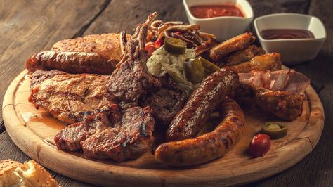 Why It's Best To Add Mesquite Flavor To Dark Meats — Tasting Table Lebanese Shawarma, Sausage Burgers, Dark Meat, Grilling Season, Tasting Table, Meat Lovers, Charcoal Grill, Steak, Grilling