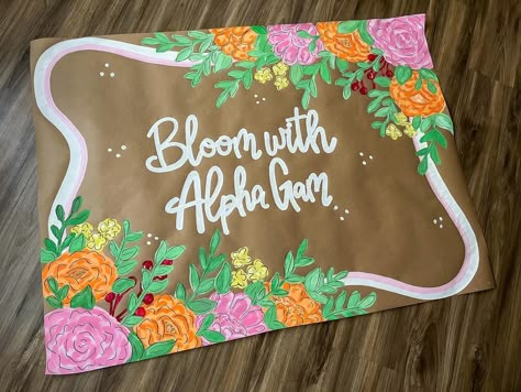 Absolutely love this one!!🌸🌟🩷 #flowers #banner #banners #brownpaperbanner #butcherbanner Painted Banners Sorority, Floral Banner Design, Flower Sorority Banner, Butcher Paper Sign, Flower Birthday Banner, Painted Banner Ideas, Brown Paper Signs, Brown Paper Banner, Party Banner Design