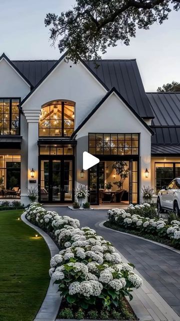 Alpine Manor | Real Estate | Architecture | Design on Instagram: "Rustic elegance meets luxury in this breathtaking ranch-style home by @aiforarchitects! 🏡🌄 From the beautiful natural materials to the sophisticated design, this home strikes the perfect balance between cozy and upscale. Imagine coming home to this masterpiece every day—talk about a dream! 😍 What’s your favorite part of a ranch-style home? Let us know in the comments!👇  #RanchStyleHome #RusticElegance #LuxuryLiving #AIforArchitects #UtahHomes #DreamHome #CustomHomes #ArchitectureLovers #UtahRealEstate #HomeInspo #UtahBuilder #LuxuryHomesUtah #HomeDesign #UtahLiving #MountainHomes #UtahArchitecture #CurbAppealGoals #HomeStyle #RusticLuxury #ModernCraftsmanship #UtahConstruction #AlpineManor #BeautifulHomes #LuxuryLivingUt White House With Black Windows, French Country Ranch House, Luxury Farmhouse Plans, Alpine Manor, Luxury Exterior Design, Luxury Exterior, Modern Contemporary Homes, Ranch Style Home, Transitional House