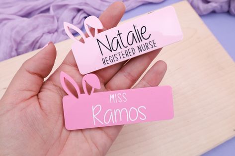 Make Easter extra special with a custom magnetic name tag designed just for you! Perfect for Easter baskets, teacher gifts, office name tags, or spring celebrations, these adorable tags feature vibrant Easter-themed designs and personalized engraving for a unique touch. SIZE: 3.370"W x 1.8"H Magnetic Name Tags, Name Tag Design, Office Names, Teacher Badge, Spring Celebration, Name Badges, Name Tags, Name Tag, Easter Baskets