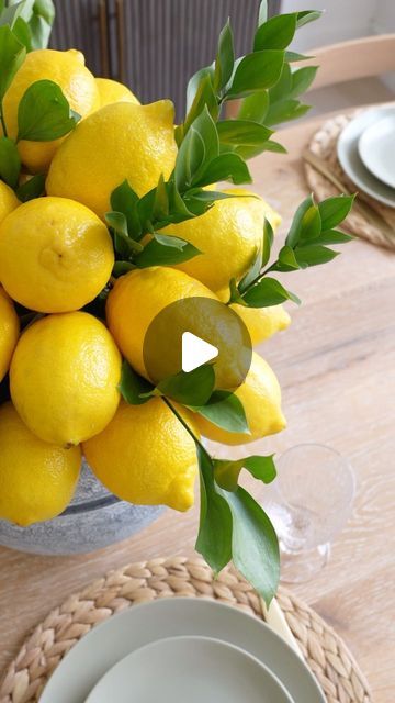 Carol & Ale on Instagram: "Unique Lemon Centerpiece Idea 🍋🍋 how perfect is this arrangement for Spring / Summer?? It’s so easy to make and it looks SO beautiful!

You just need barbecue skewers, lemons and your favorite greenery! Comment LINKS and I can send you a DM with the links to everything I used (including this beautiful vase)

Let me know if you make it!

#partyideas #centerpiece #centerpiecesideas #centerpieceideas #partydecor #springdecor #springdecorating #summerdecor #summerdecorating #tablescapestyling #tablescapetuesday #tablescapeideas #floralarrangement #homeblogger #pinterestinspired" Decor With Lemons Ideas, Lemon Arrangements Vases, Lemon Vase Centerpiece, Lemon Flower Arrangements, Lemon Centerpiece Ideas, Decorating With Lemons, Easy Diy Centerpieces, Spring Centerpiece Ideas, Floral Table Centerpieces