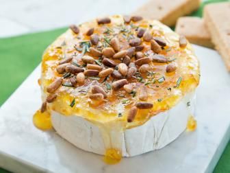 Dress Up a Simple Wheel of Brie in Minutes #cheese #brie #appetizers Baked Brie With Orange Marmalade, How To Serve Brie Cheese, Brie Toppings, Brie Wheel, Brie Cheese Recipes, Potluck Food, Charcuterie Appetizers, Super Club, Thanksgiving Entertaining