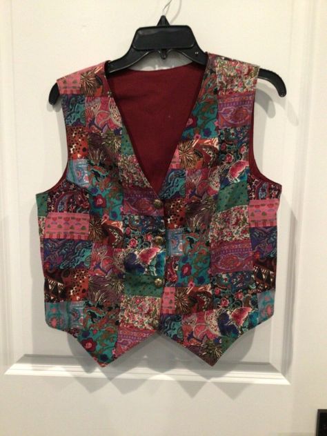 New without tags women’s vest estimate size large see dimensions  Sleeveless v neck button down fully lined Patchwork quilt design Measurements 15 inches across shoulders  19 inches armpit to armpit  21 inches shoulder to hem  Bin Nina Patchwork Vest Outfit, Vintage Vest Outfit, Thrift Inspiration, Diy Vest, Quilt Vest, Handmade Vest, Clothing Board, Patchwork Vest, Colorful Vest