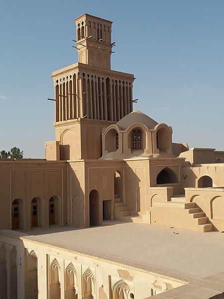 Aghazadeh Mansion and its windcatcher was built during the Qajar Dynasty and is located in Abarkooh,Yazd Province, Iran.The windcatcher in this mansion is regarded as one of the finest examples of windcatchers in the world.There are 19 air-adjusting vents in the windcatcher, which are internally connected to the second windcatcher. This windcatcher can do the air-adjustment even if there is no wind blowing. Unlike most windcatcgers, this one is a two-story structure. Windcatcher Architecture, Memory Palace, Phoenix Reborn, Qajar Dynasty, Passive Cooling, Iranian Architecture, Persian Architecture, Life Drawing Reference, Architecture Drawing Plan