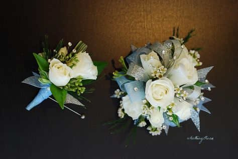 Silver and Light Blue Wrist Corsage & Boutonniere | by Amrose Flowers Corsage For Light Blue Dress, Light Blue And Silver Corsage, Light Blue Wrist Corsage, Light Blue Corsage And Boutonniere, Light Blue And White Wedding, Prom Corsage Blue, Blue Wrist Corsage, Blue And White Wedding Flowers, Groom Corsage