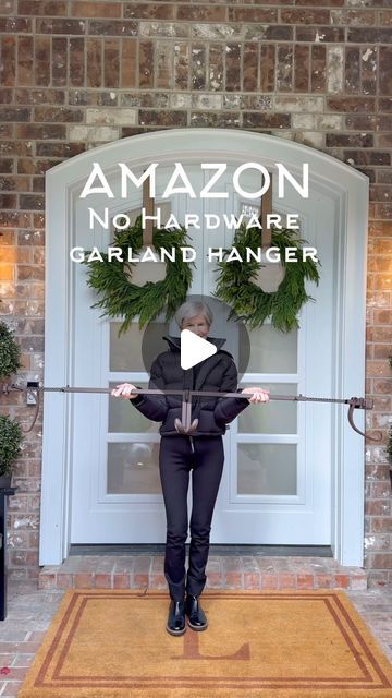 Jodie Kammerer • AMAZON HOME FINDS on Instagram: "Make garland hanging easy with this heavy duty garland hanger!

COMMENT FOR LINKS or shop my link in bio! 
Please note: you must be following me @jodie.thedesigntwins for links to appear 🫶 

No hardware needed. No damage to your door or surround! Fully adjustable. Available in 4 beautiful finishes.

#christmashacks #amazonhome #amazonfinds #christmasdecor #garland" How To Attach Garland Around Front Door, Garland Around Garage Door, Hanging Garland Around Door, Hang Garland Around Door, How To Hang Garland Around Front Door, How To Hang Garland Around Doorway, Door Garland Ideas, Teardrop Garland, Make Garland