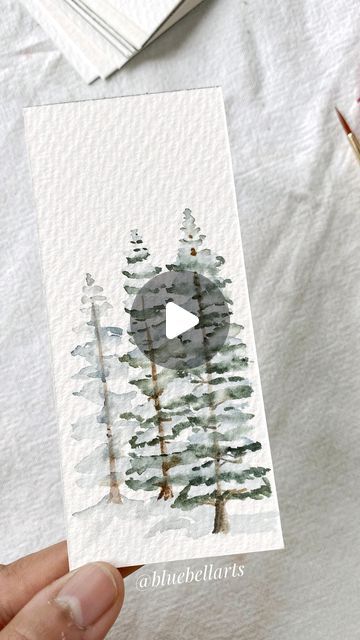 Snowy Tree Watercolor, Easy Robin Painting, Easy Watercolor Pine Trees, Evergreen Watercolor Painting, Pine Trees Watercolor Painting, Watercolor Art Pine Trees, Birch Tree Watercolor Tutorial, How To Paint Pine Trees In Watercolor, Winter Water Coloring Ideas