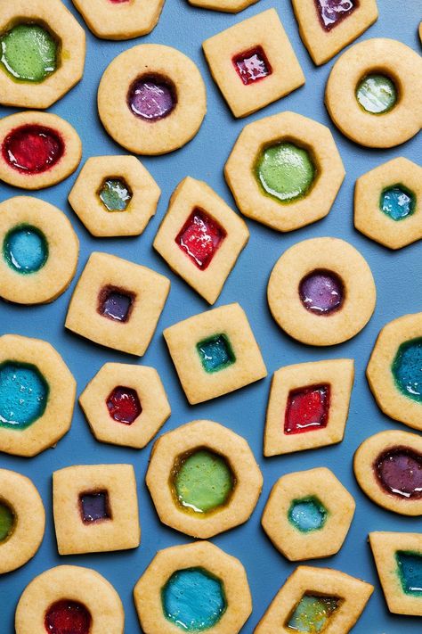 Stained Glass Cookies - Delish.com Cannoli Cookies Recipe, Sugar Cookie Recipes, Unique Christmas Cookies, Glass Cookies, Sesame Cookies, Stained Glass Cookies, Leftover Halloween Candy, Mexican Wedding Cookies, Colourful Christmas