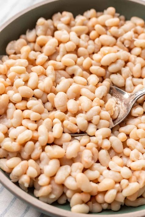 These Instant Pot Navy Beans are a game-changer for anyone looking to save time and money while cooking from scratch. Whether you choose to soak your beans or cook them straight from dry, this foolproof method yields perfectly tender beans every time. Soaked Beans Instant Pot, Instant Pot Navy Beans, Beans Instant Pot, Navy Beans Instant Pot, Navy Bean Recipes, Oven Roasted Potatoes Easy, How To Soak Beans, Navy Bean, Oven Roasted Potatoes