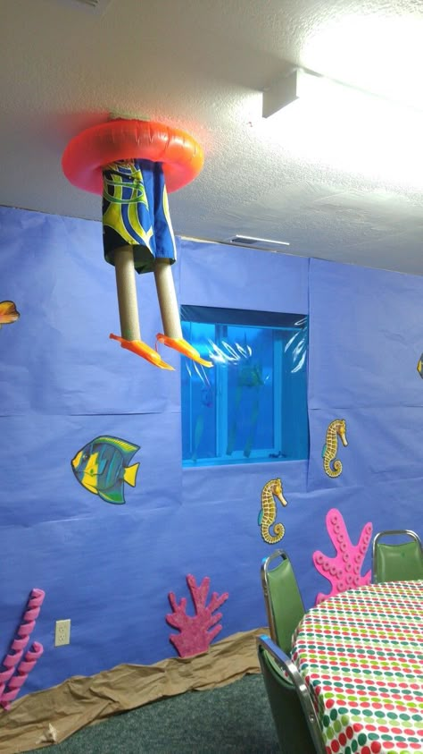 Scuba Vbs Entrance, Under The Ocean Decorations, Beach Themed Hallway Decor School, Beach Decorations For Classroom, Vbs Underwater Decorations, Breaker Rock Beach Diy Decorations, Ocean Themed Hallway Decorations, Scuba Theme Vbs Decorations, Beach Theme Hallway