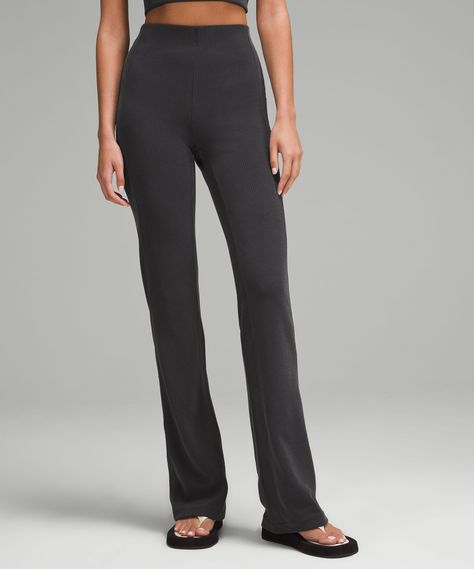 Luxury look, lounge feel. These flared pants are soft on the outside and sleek next to skin. Designed for Casual. Flares out from the knee to hem:35.5" inseam, intended to skim the floor for heights of 5'9" and above. Back drop-in pocket. Wide, ribbed internal waistband is soft next to skin, stays put, and creates a sleek look. Peach-Fuzz Soft, Ribbed SoftstremeTM Fabric. Luxury Look, Peach Fuzz, Black Flare, Flared Pants, Tall Women, Lululemon Women, Sleek Look, Leggings Shop, Flare Pants