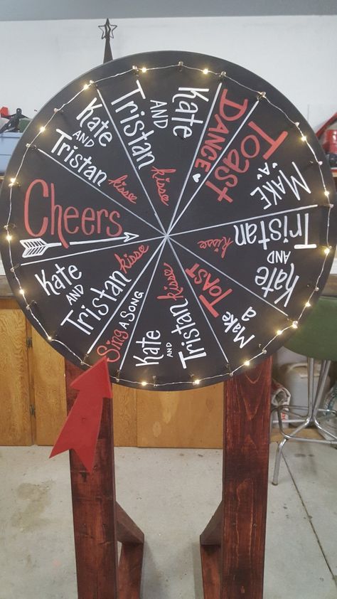 Our wedding wheel for the kissing game. Wedding Wheel Game, Kitsch Wedding, Kissing Games, Non Traditional Wedding Rings, Irish House, Non Traditional Wedding Ring, Festival Themed Wedding, Makeup 2023, Traditional Wedding Rings