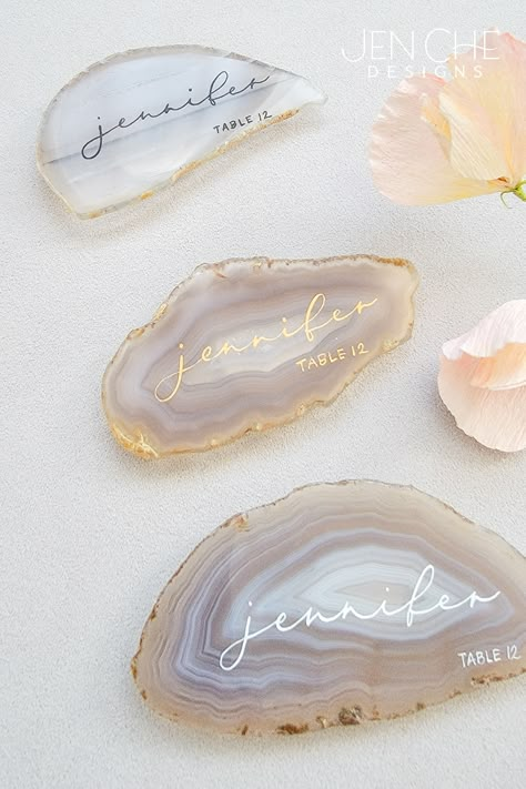 3 neutral agate place cards with black, gold, and white modern calligraphy using pointed pen by Jen Che Designs Agate Place Cards, Crystal Themed Wedding, Agate Wedding Decor, Unique Wedding Table Ideas, Goddess Birthday, Unique Place Cards, Crystal Wedding Theme, Place Card Ideas, Sayulita Wedding