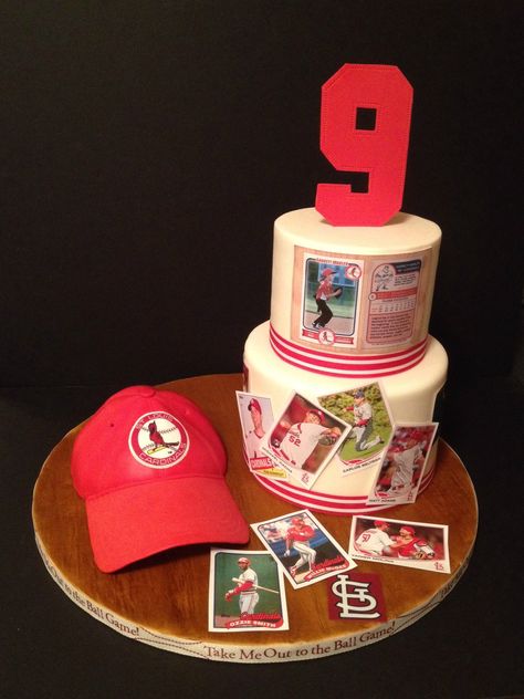 STL CARDINALS BASEBALL - I made this for my nephew's birthday.  He is infatuated with the St. Louis Cardinals!  My edible image printer was broken, so the baseball cards are just paper, and are not edible.  I found an app for my phone and made him his own baseball card on the top tier.  The hat is made from cake smashed together and covered in fondant.  The 9 is made from fondant, and the bottom board is covered in fondant, air brushed to resemble wood. St Louis Cardinals Birthday Cake, Baltimore Orioles Birthday Cake, Edible Image Printer, Stl Cardinals Outfit, Football Birthday Cake, Baseball Cake, Birthday Flowers Bouquet, Stl Cardinals Baseball, Edible Printer