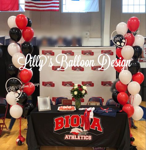 #balloonarch #spiralballoonarch #red #backdrop #studyhard #balloonbouquets #collegesigningday #college #satx #Tx #vibrant #SA #bekind #celebrations #balloonbouquet #prouddad #texas #lillysballoondesign #balloondecorations #school #sanantonio #art #becreative #family #lookinggood #accomplishments #eventsinsanantonio #proudmom #beautiful #celebrate Signing Table Decor, College Signing Day, Senior Table, Red College, Red Backdrop, Balloon Design, Graduation Ideas, Balloon Bouquet, Proud Mom