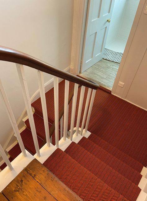 Orange & black flatweave stair runner with Herringbone design on white wooden stairs that lead to a fully fitted half landing. Herringbone Stair Runner, Stair Carpet, Wooden Stairs, Stair Runners, Carpet Stairs, Stair Runner, Traditional Interior, Classic Pattern, Wool Carpet