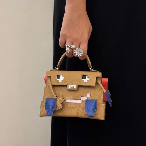 HOW CUTE! The Kelly Doll Picto is the perfect addition to the Kelly Doll family and one of the most sought-after bags. Looking for something special? DM us 📸 @cruisewithusx @nohastyleicon 🔎 Kelly Doll, Kelly Doll Picto, Kelly Picto, Kelly Idolle #hermeskellydollpicto #kellydollpicto #kellypicto #kellyidole #hermeskellyidole #dubaibags #dubai Kelly Doll, Doll Family, Looking For Something, Hermes Bag, Something Special, Instagram Feed, Dubai, Dolls, Purses And Bags