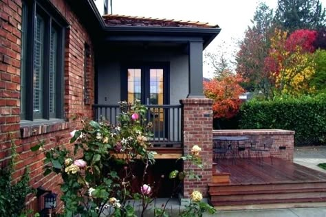 RED BRICK HOUSES WITH BLACK TRIM - design indulgence Dark Front Porch, Michael Knowles, Traditional Entry, Red Brick Exteriors, Outdoor Makeover, Best Exterior Paint, Dark Trim, Orange Brick, Exterior Inspiration