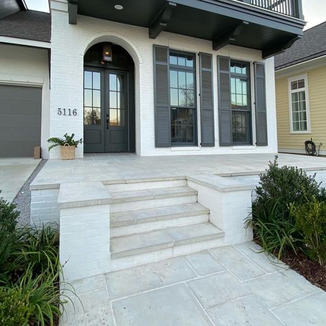 Gorgeous @peacockpavers #Oyster install by @scheffyconstruction @hilaryscheffy and @mikesullivanarch in @liverouzan This photo really shows… Pool Stamped Concrete, Stamped Concrete With Retaining Wall, Ashler Slate Stamped Concrete, Large Concrete Pavers, Peacock Pavers, Honed Concrete Pool Surround, Seamless Stamped Concrete, Front Porch Stone, Paver Steps