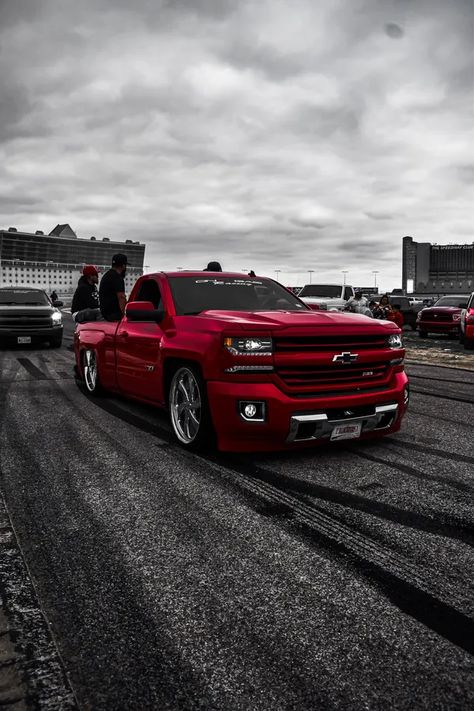 Download Red Chevy Dropped Truck Wallpaper | Wallpapers.com Dropped Trucks Wallpapers, Wallpapers Mexican, Low Trucks Wallpaper, Takuache Truck, Truck Wallpaper Iphone, Mexican Trucks, Trucks Wallpaper, Chevy Trucks Lowered, Iphone Images