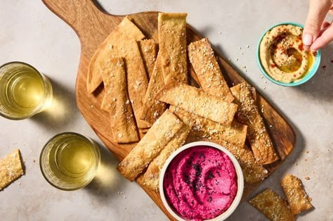 Light and Crisp Olive Oil Crackers Recipe | King Arthur Baking: If you can stir together a handful of ingredients and use a rolling pin, you can bake homemade crackers better those from a fancy box — and for a fraction of the price. Make olive oil crackers once and you may never buy them again! Olive Oil Crackers, Savory Cookies, Snacks Crackers, King Arthur Recipes, Dinner Party Appetizers, Yeast Starter, Food Justice, High Altitude Baking, Crackers Recipe