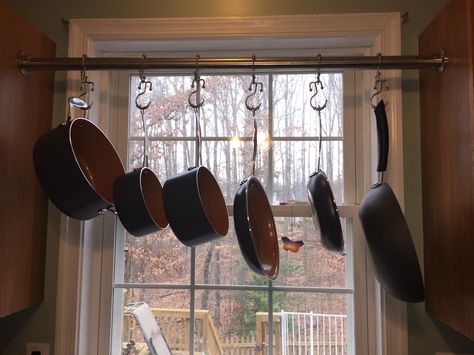 Pot rack made from metal closet rod and hung between two wall cabinets over sink. Ceiling Pan Holder Pot Hanger, Pot Rack Above Sink, Cabinets Over Sink, Metal Closet, Above Sink, Pot Rack Hanging, Inside House, Lone Pine, Over Sink