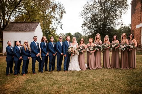 Fall Wedding Colors Bridesmaids And Groomsmen, Bridal Party With Navy Suits, Dark Navy Suit Wedding Color Combos, Fall Wedding Navy Suits, Navy Blue Groom Suit Colour Schemes, Bridal Party Navy Suits, Bridesmaid Dresses With Navy Groomsmen, Brown And Blue Wedding Colors, Navy Groomsmen Suits And Bridesmaids