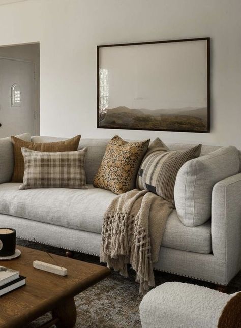 Winter Cosy Home, How To Decorate With Grey Walls, Heather Grey Couch Living Room, Modern Colonial Living Room Ideas, White And Dark Brown Living Room, Cozy Grey Couch Living Room, Greige Couch Living Room, Grey Couch Brown Pillows, Dark Beige Couch Living Room