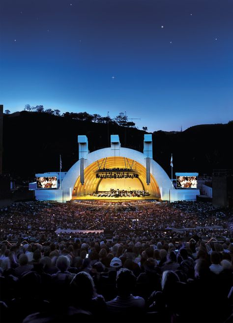 Nestled in California’s storied Hollywood Hills, the Hollywood Bowl is the largest natural outdoor amphitheater in the U.S. Amphitheater Architecture, Outdoor Amphitheater, Outdoor Theatre, Event Concept, Orchestra Concerts, White Rocks, California Outdoor, Concert Stage Design, Summer Concerts