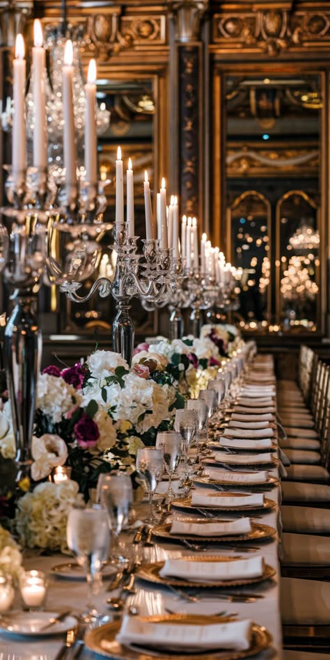 An old money, royal style wedding table with chandeliers and candles. Vintage Modern Wedding Decor, Old Money Wedding Theme, Tall Greenery Centerpieces, Speakeasy Wedding Reception, Candle Tablescapes Wedding, Wedding Outline, Industrial Wedding Reception, Romantic Wedding Theme, Old Money Wedding