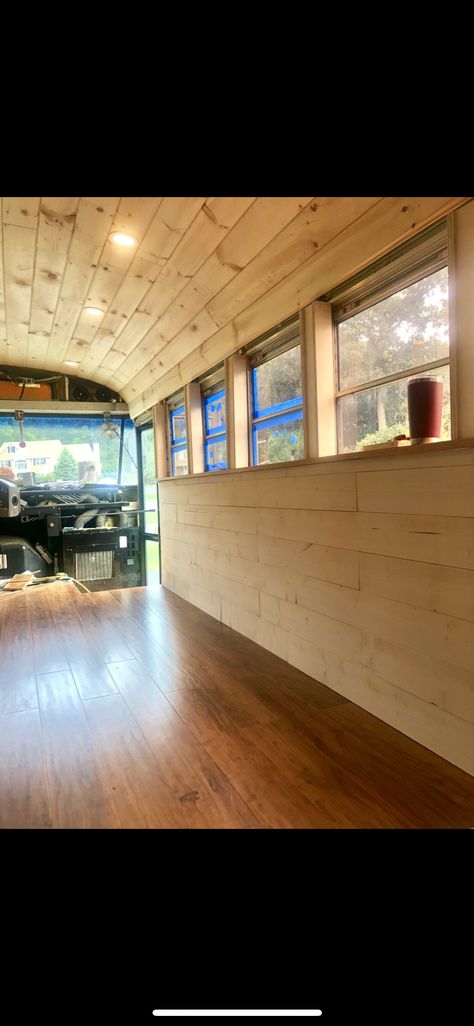 Repurposed School Bus, Short Skoolie Interior, School Bus Boutique, School Bus Transformation, Skoolie Deck Ideas, School Bus Food Truck Conversion, Short School Bus Conversion Interiors, Rv Bus Interior, School Bus Makeover