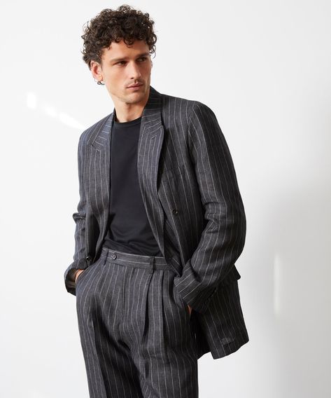 Our Wythe Suit Jacket is both elegant and casual, representing the epitome of soft tailoring. It has an oversized, vintage-inspired fit and natural shoulders; slouchy and chic, but not shapeless. There’s also a double vent in the back and a lightweight butterfly lining, to help with keeping your cool. The fabric is an Suit Graduation, Suit Vintage Men, Pinstripe Suit Aesthetic Men, Mens Suits Style Modern Casual, 90s Mens Suit, Classic Pinstripe Suit, 60s Suits For Men, Modern Suits Men, 90s Suit Men