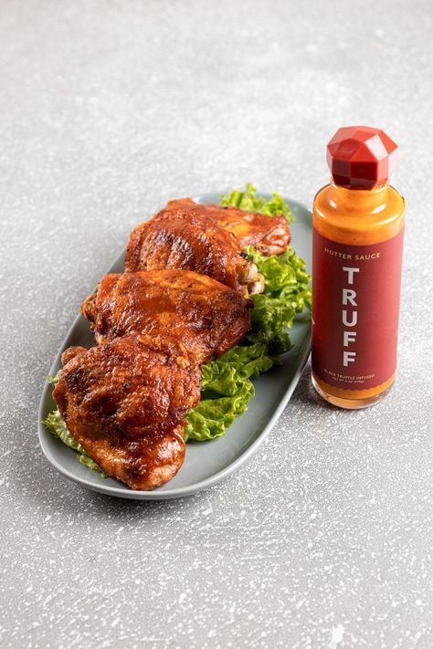 From a fiery take on Eggs Benedict to spicy chicken thighs and more, see what you can make with TRUFF Truffle-Infused Hot Sauces. Recipes With Truffle, Spicy Chicken Thighs, Truffle Hot Sauce, Juice Bar Menu, Catering Platters, Wine Cheese Pairing, Sandwich Menu, Specialty Sandwiches, The Nugget