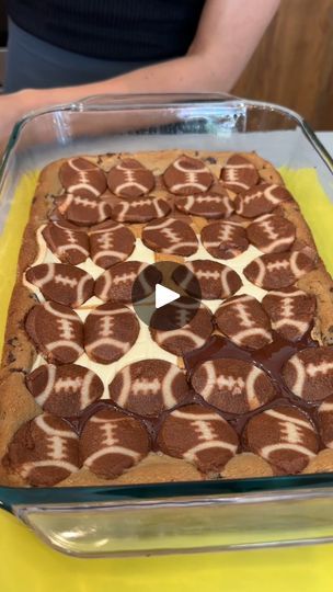 82K views · 253 reactions | favorite game day dessert | favorite game day dessert

dessert lasagna with cookies, peanut butter, chocolate, and cookies!

thanks for watching!
this video was produced by Network... | By Jacky’s Kitchen | We just have our chocolate chip
cookie dough that I'm pressing down into the bottom of our
pre-greased baking dish and make a nice layer here of our
cookies. So, so delicious. Beautiful. We have some organic
peanut butter. I'm just going to drizzle this right on top
and make a beautiful peanut butter filling layer. Yummy. I
love peanut butter and chocolate together. We're
layering up with some delicious chocolate. I'm using a milk
chocolate bar here. Guys, let me know what your favorite
brand of chocolate is. Just going to place this right
here, right on top. Organic Peanut Butter, Buy Cookies, Peanut Butter Filling, Chocolate Brands, Chocolate Chip Cookie Dough, Delicious Chocolate, Chocolate Bar, Chocolate Milk, Cookie Dough