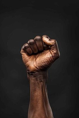 the hand raised with closed fist black power protest and revolution gesture lives matter Backgroun Black Power Wallpaper, Garnet Steven, God Hand, Afro Comb, Garnet Steven Universe, Modern Tv Unit Designs, Hand Raised, Power Wallpaper, Day Background