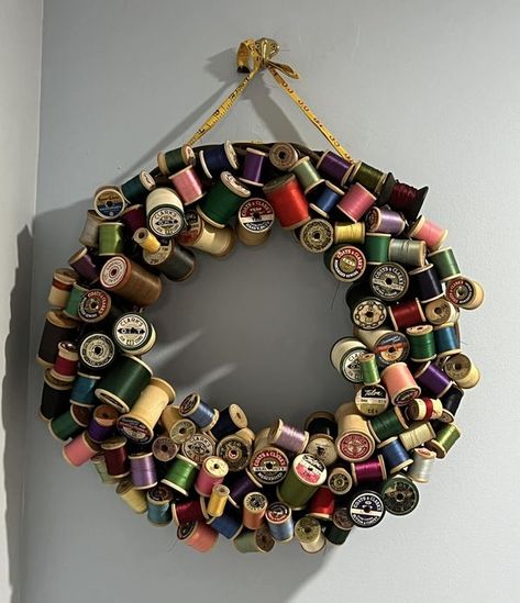 Recycle, Reuse and Repurpose  !! | Made a wreath out of old wooden spools of thread | Facebook Thread Spool Wreath, Spools Of Thread Crafts, Wood Spool Crafts, Wooden Thread Spool Ideas, Spool Wreath, Thread Spool Crafts, Wood Thread Spools, Spool Art, Wooden Spool Projects