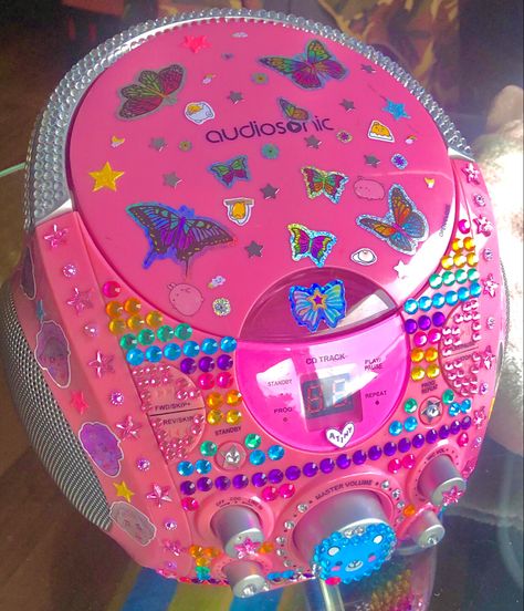 Pink decorated CD player Decorated Cd Player, 2000s Cd Player, Cute Cd Player, 2000 Technology, 2000 Vibes Aesthetic, Cd Player Aesthetic, 2003 Aesthetic, Cd Walkman, Quirky Aesthetic