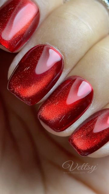 Ruby Cat Eye Nails, Red Chrome Nails Acrylic, Red Nail Chrome, Red Cat Eye Christmas Nails, Red December Nails, Red Chrome Christmas Nails, Red Chrome Nails Designs, Red Cat Eye Nails, Nails 2023 Winter