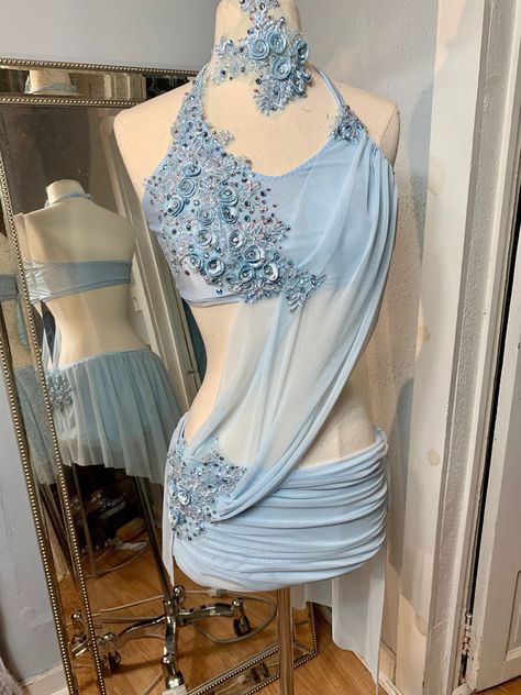 Lyrical Dance Costume . Light Sky blue top with a lt blue Rhinestone appliqués. Crystal AB rhinestones and Swarovski LT sapphire ab stones will be added. In progress is size MA will be ready to ship in two days. Matching lt blue brief and assymetrical skirt with rhinestones on the applique. Matching hairpiece. Gorgeous in this color way but can also be custom ordered in another color. Can be custom made to your measurements. In total over 100 Swarovski crystals ( AB) Can be custom ordered in any Blue Lyrical Costume, Lyrical Dance Costumes Solo, Dance Costume Lyrical, Skirt With Rhinestones, Black Dance Costumes, Danza Latina, Solo Dance Costumes, Dance Moms Costumes, Cute Dance Costumes