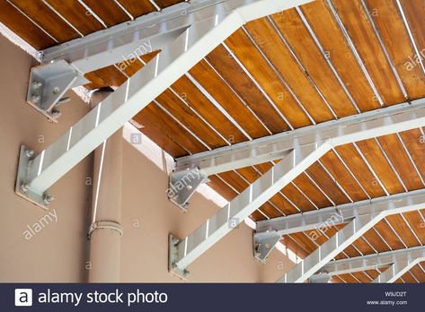 Wooden balcony floor mounted on cantilever beams, bottom view Stock Photo Steel Brackets For Beams, Cantilever Balcony Design, Cantilever Deck Design, Floating Balcony, Cantilevered Balcony, Balcony Addition, Types Of Kitchen Flooring, Cantilever Balcony, Cantilever Architecture