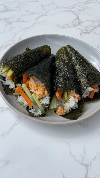 Spicy Salmon Sushi Hand Rolls Sushi Hand Rolls, Hand Roll Sushi, Spicy Salmon Sushi, Salmon Sushi Rolls, Sriracha Salmon, Cucumber Rolls, Sushi Roll Recipes, Salmon Roll, Canned Salmon