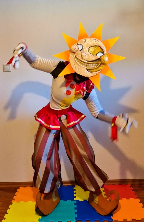 Sun fnaf cosplay Sun Drop Costume, Sun Moon Security Breach, Sun Fnaf Outfit, Diy Sundrop Fnaf Costume, Eclipse Cosplay Fnaf, Daycare Attendant Cosplay, Sun Cosplay Outfit, Sun And Moon Costume Fnaf, Diy Fnaf Cosplay